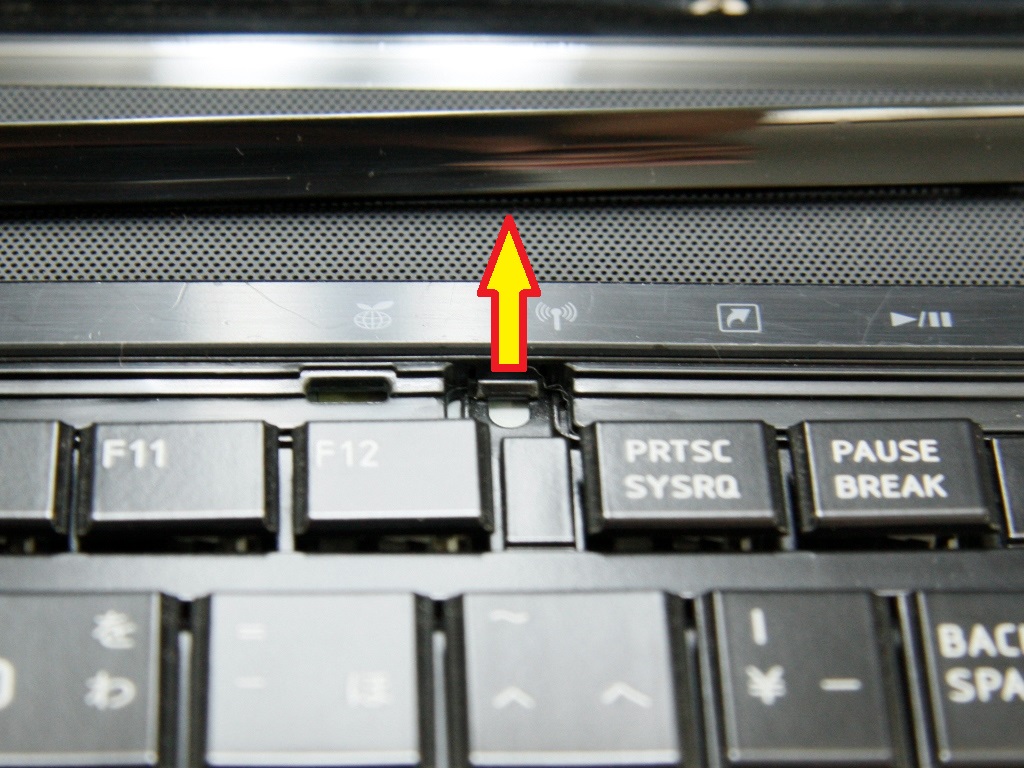 Push Latch to Remove the Keyboard