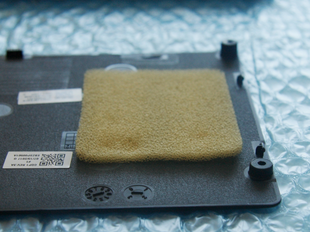 Paste the sponge sheet on the bottom cover 2