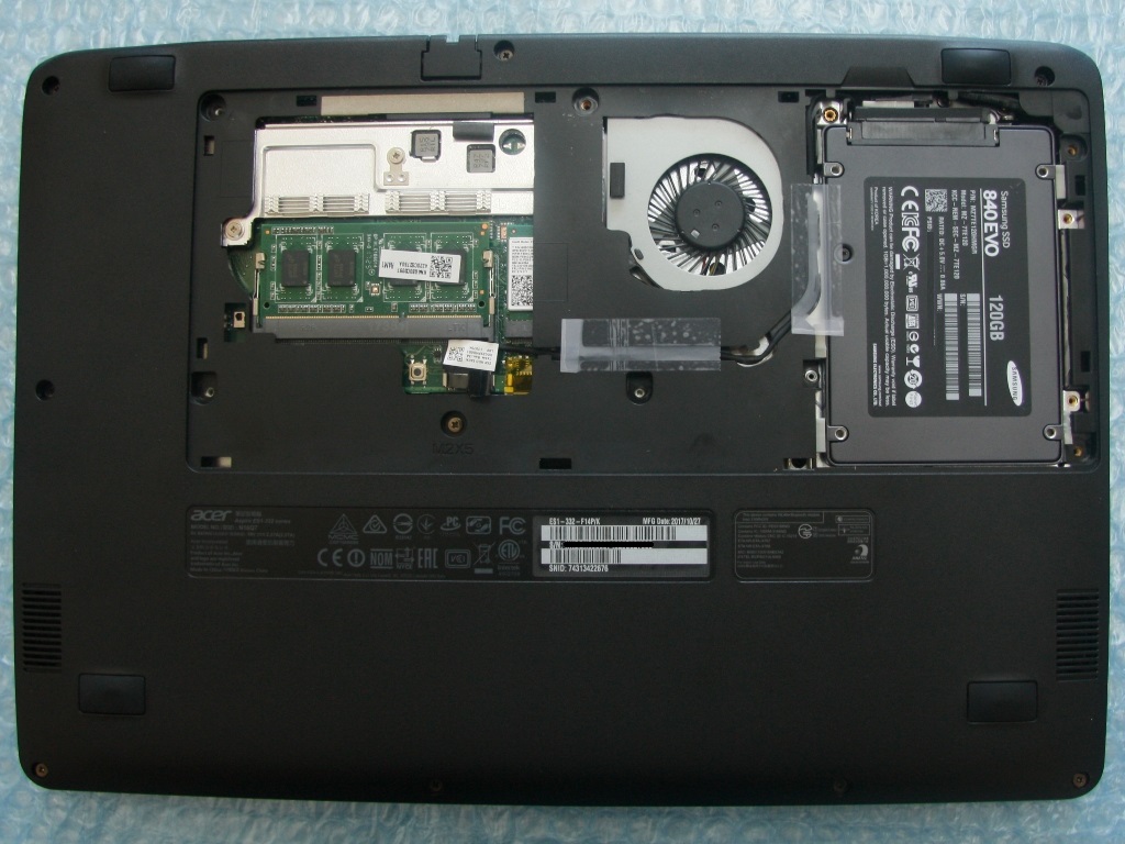 Complete the installation of the 2.5 inch SSD in the Acer ES13 eMMC model 1