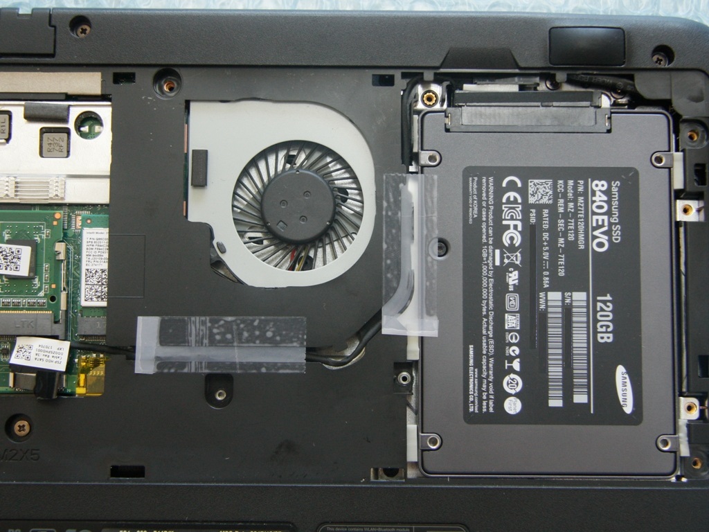 Complete the installation of the 2.5 inch SSD in the Acer ES13 eMMC model 2