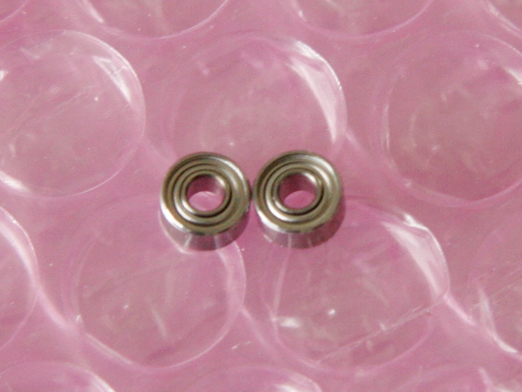Two ball bearings